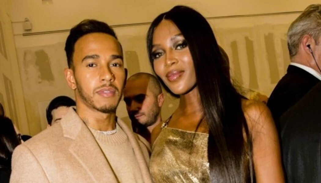 VERSACE WOMEN’S SS 18  (PHOTO – LEWIS HAMILTON AND NAOMI CAMPBELL AT THE VERSACE SS 18 SHOW)