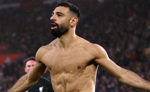 PREMIER LEAGUE : SUNDAY – 24/11/2024  (PHOTO – MO SALAH CELEBRATES SCORING A BRACE BY SHOWING OFF HIS CHISELLED ABS!)