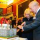 HAPPY BIRTHDAY KING CHARLES!  (PHOTO – KING CHARLES CUTS HIS WINDSOR CASTLE SHAPED BIRTHDAY CAKE ALONGSIDE QUEEN CAMILLA)
