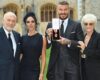 DAVID BECKHAM SPEAKS OF HIS PRIDE AFTER BEING KNIGHTED BY KING CHARLES ON 04/11/2025 (PHOTO – SIR DAVID, LADY VICTORIA & DAVID’S PARENTS TED AND SANDRA)