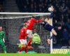 FIFA WORLD CUP EUROPEAN QUALIFYING : SCOTLAND VS DENMARK – 18/11/2025 (PHOTO – SCOTT MCTOMINAY SCORES OVERHEAD BACK-KICK)