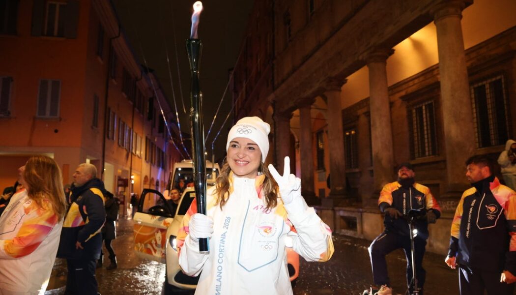 OLYMPIC TORCH RELAY HIGHLIGHTS!  (PHOTO – ESTER BALASSINI CARRIES THE TORCH)