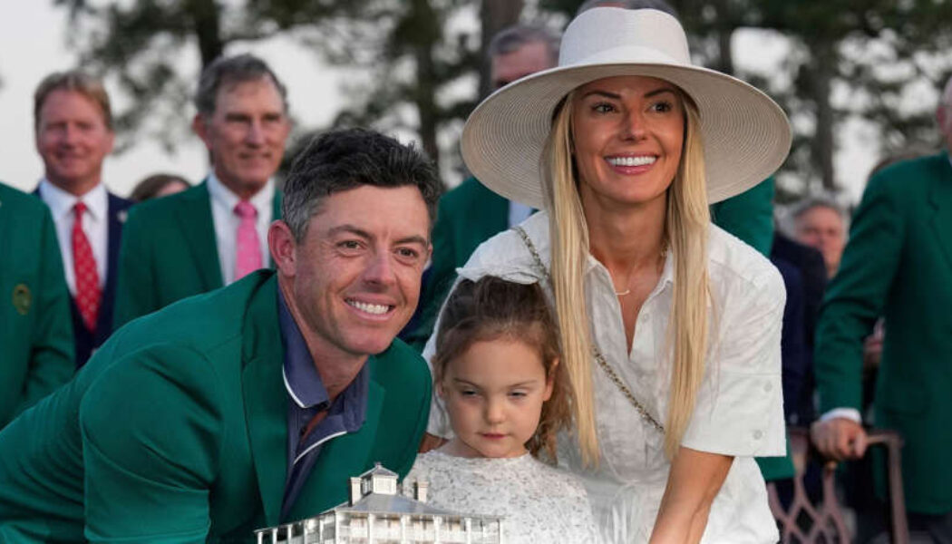 RORY MCILROY WINS THE MASTERS – AGAIN!  (PHOTO – RORY MCILROY CELEBRATES WITH HIS FAMILY WEARING HIS GREEN JACKET)