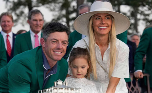 RORY MCILROY WINS THE MASTERS – AGAIN!  (PHOTO – RORY MCILROY CELEBRATES WITH HIS FAMILY WEARING HIS GREEN JACKET)